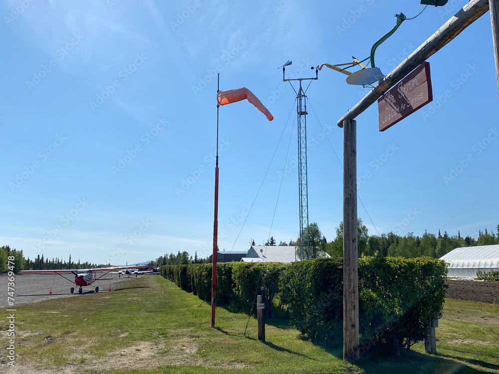 Port Alsworth, Alaska The Farm Lake Clark Air Service sign. The Farm
