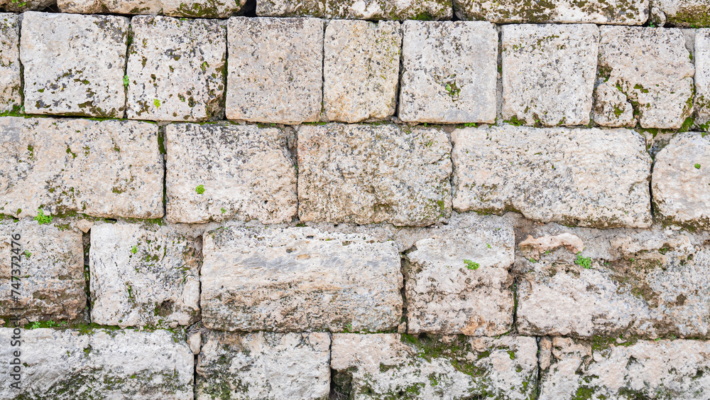 close-up of the stone wall of the ancient Greek temple in the city of Perga in Turkey close-up of the stone wall of the ancient Greek temple in the city of Perga in Turkey