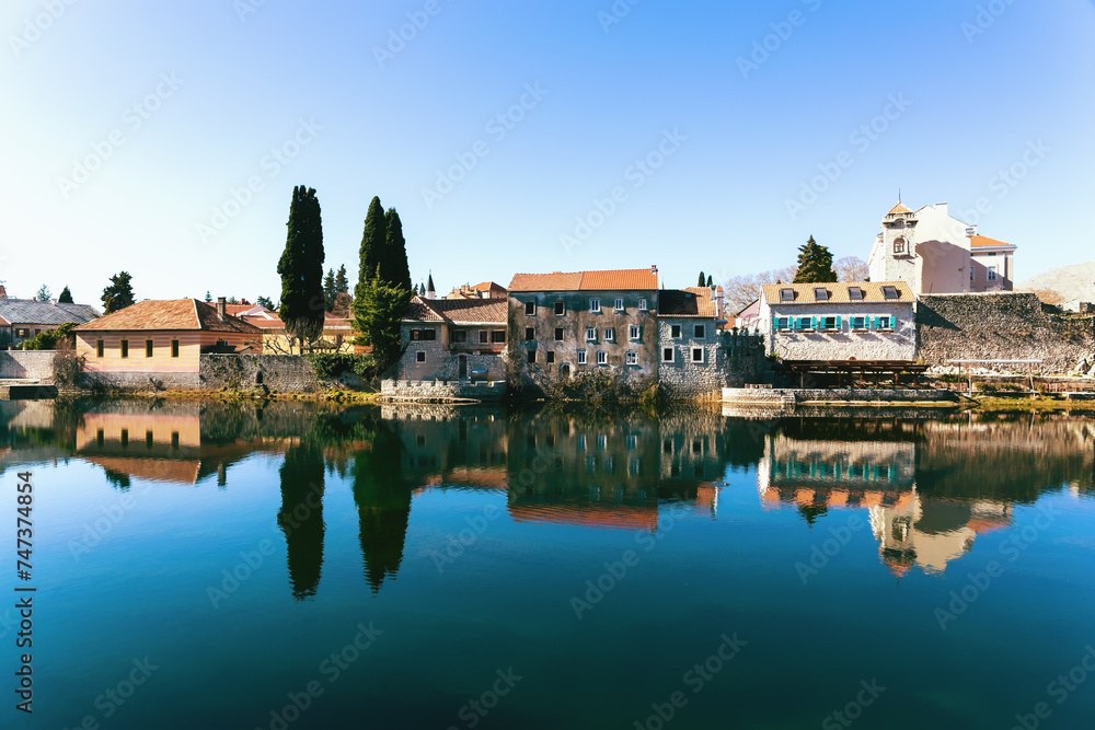 Trebinje Old Town, Bosnia and Herzegovina. View of old town with reflection in river in calm sunny day