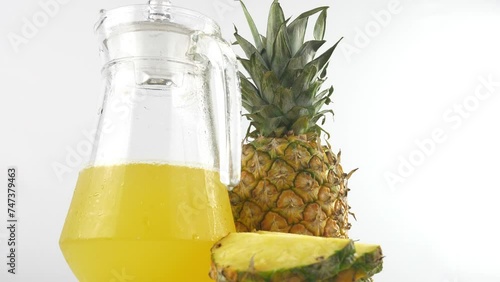 Ripe juicy pineapple, juice and slices