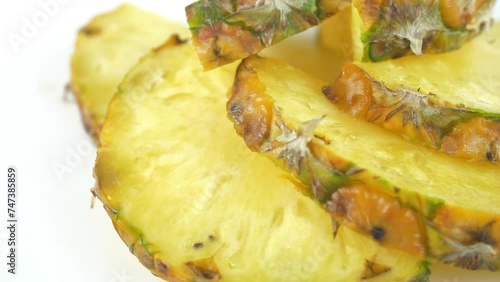 Ripe, juicy, yellow pineapple slices