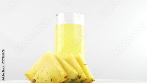 A pineapple. Fruit and berry salads. Juicy ripe slices.