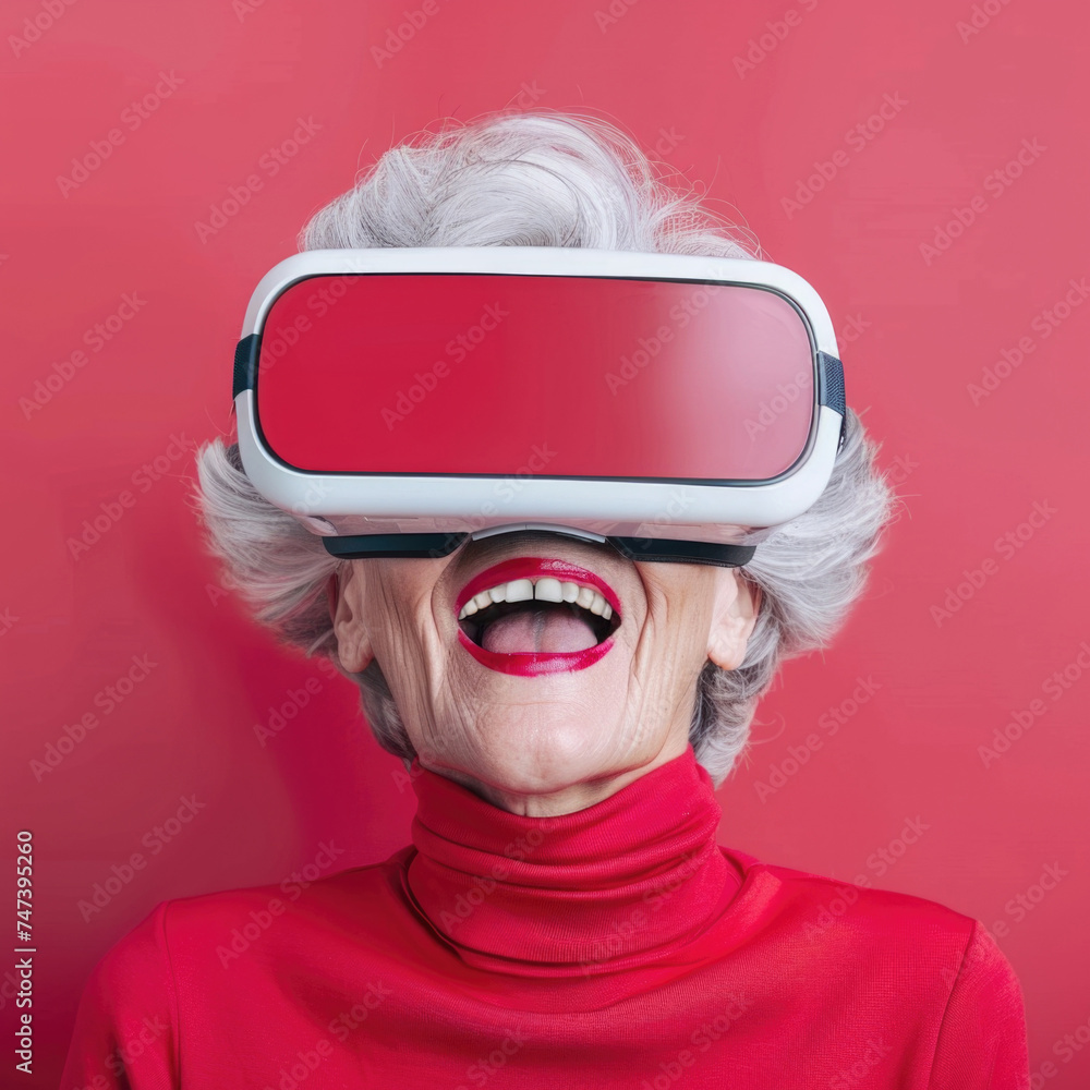 Happy and cheerful elderly woman in virtual reality glasses Happy and cheerful elderly woman in virtual reality glasses