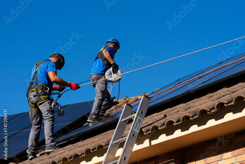 Solar energy installation workers working