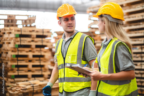 Man and woman workers with ...