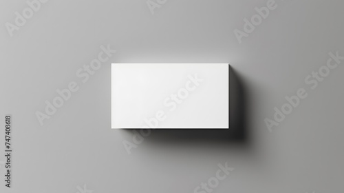 Blank white realistic business card for mockup on bright grey background textured. name card. copy space.  © Almultazam