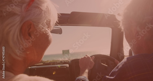 Caucasian senior couple enjoying in the car during a roadtrip