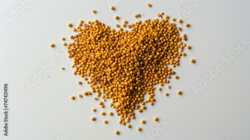 Spicy love for cooking: Top view of a heart-shaped mustard creation on a clean white background.