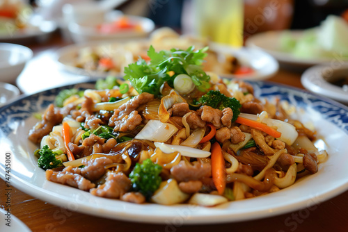 A plate of moo shu pork, a dish of northern Chinese origin, possibly originating from Shandong.