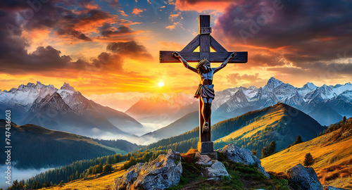 Wonderful Mountain cross silhouette against majestic sunset sky