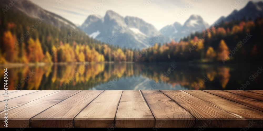 The empty wooden table top with blur background of lake and mountain in ...