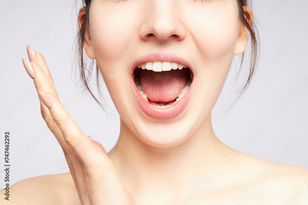Expressive facial expressions. A beautiful girl is in awe. Isolated on background Expressive facial expressions. A beautiful girl is in awe. Isolated on background