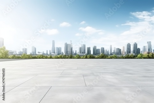An empty concrete floor with a city skyline in the background. Suitable for urban design concepts
