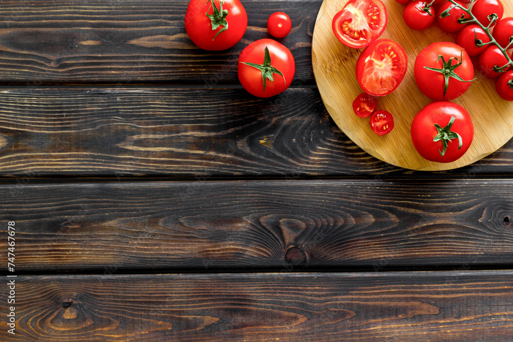 Fresh tomatoes for cooking on board. Cooking background Fresh tomatoes for cooking on board. Cooking background