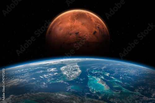 Fototapeta Naklejka Na Ścianę i Meble -  Earth and Mars in space. Solar system planets in deep space. View from space of Florida, the Bahamas, and Cuba. Elements of this image furnished by NASA.