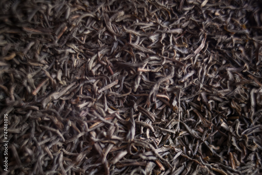 Close up of black tea leaves resemble patterned plant twigs Close up of black tea leaves resemble patterned plant twigs