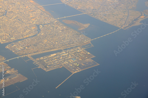 Aerial view of tokushima city, Yoshino River South Bank Ground and Tokushima-Nambu Expressway Yoshinogawa Sunrise Bridge. photo