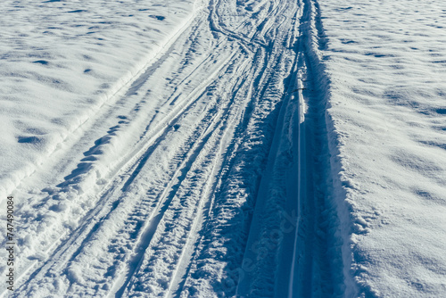 car tracks in the snow