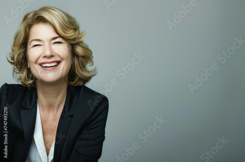 Joyful senior businesswoman with laughter