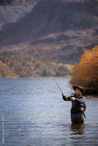Cowgirl FLy Fishing in Colorado Mountain WIlderness