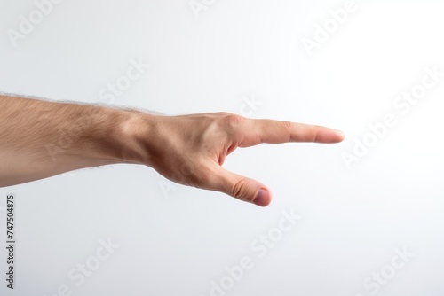 A person's hand reaching out towards an object, perfect for illustrating concepts of reaching, longing, or assistance