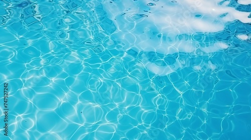 Surface of blue swimming pool,background of water in swimming pool © Shabnam