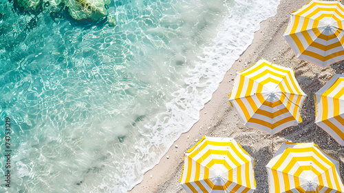 Beautiful summer beach background with parasol and beach