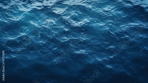 Water texture. water reflection texture background. Dark background, High resolution background of dark water or oil surface. Ocean surface dark nature background. River lake rippling Water. © Shabnam