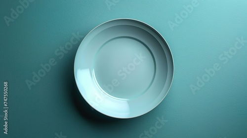 Green porcelain plate with a water green background.