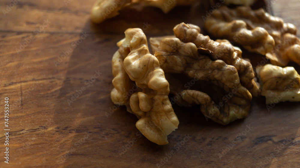 Walnut close-up. Walnut on a wooden table Walnut close-up. Walnut on a wooden table