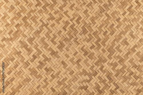Tapis en bambou tissé en forme de tresse pour création d'arrière plan. Fond en fibre végétale.