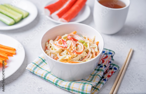 Japanese kani salad with fresh vegetables and crab sticks