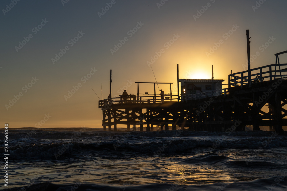 Sunrise on Argentina Beach with a view of the Dock