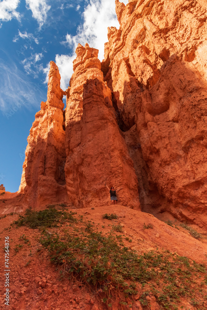 Middle-aged woman hiking the Navajo Loop Trail in Bryce Canyon National Park, Utah.