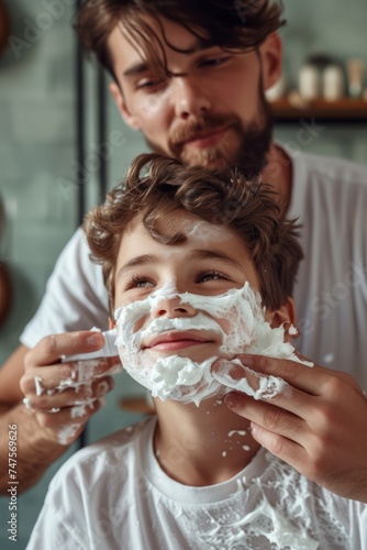 Father and son shaving together. Father and Son. Parenthood concept. Family at Home. Shaving man. Healthcare and hygiene concept. Little boy. photo