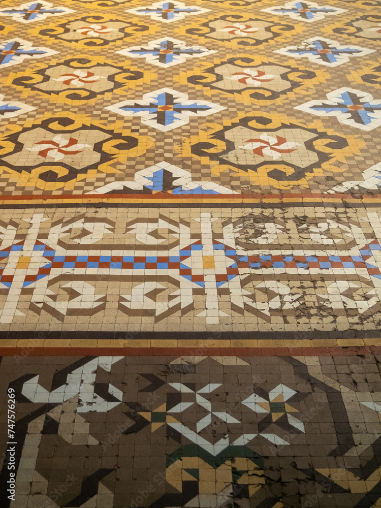 Geometric patterned floor in small tiles