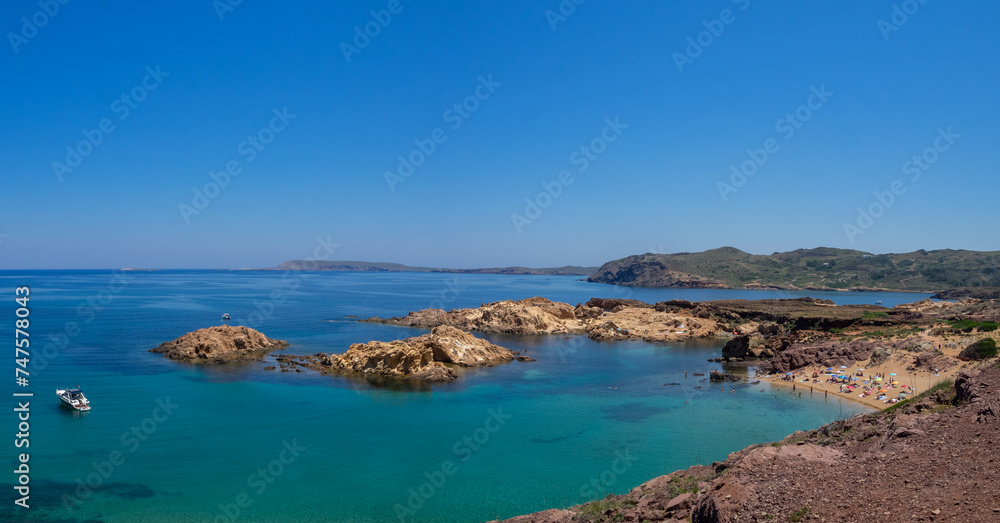 Turquoise waters and small coves of Cala Pregonda, Menorca