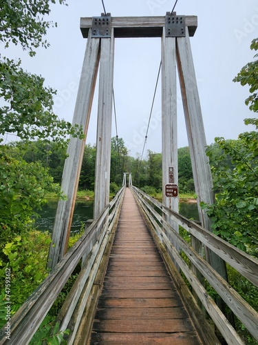 wooden bridge over the river