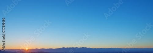 Sky blue background, Banner sunset over the mountains. Natural gradient background. Copy space