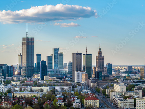 Warsaw city center, PKiN and skyscrapers under blue cloudy sky aerial landscape photo