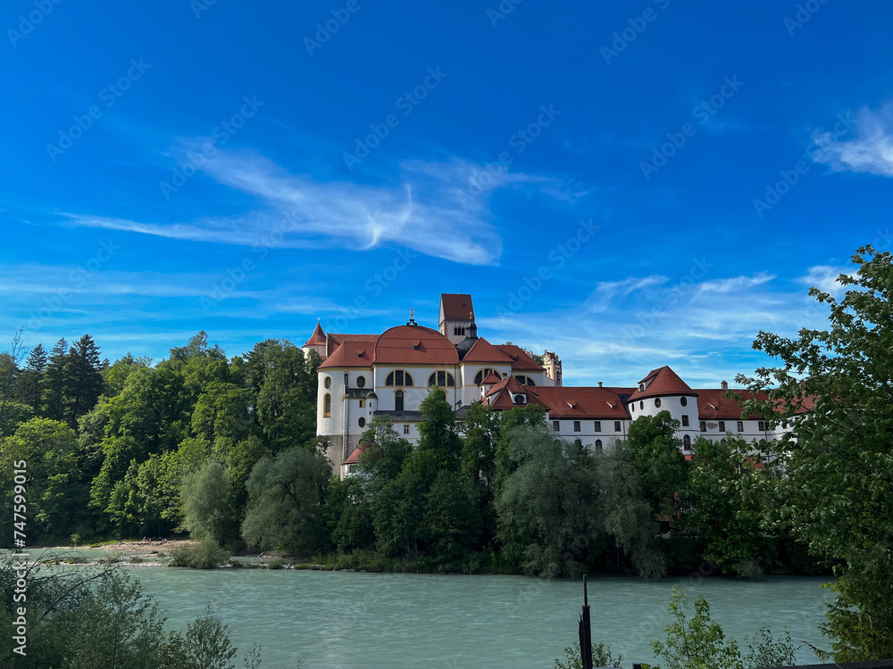 Germany, Fussen - 2022, May: Lech River and Hohes Schloss 