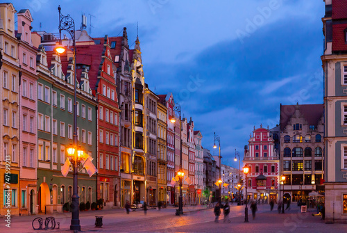 View of illuminated historical Market Square in Wroclaw on spring evening.