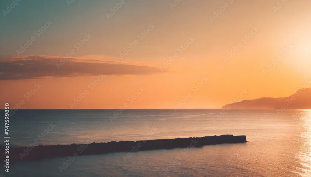 Fototapeta premium Bright orange sunset over the sea.