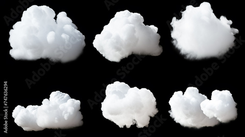 Set of realistic isolated white clouds on the black background.