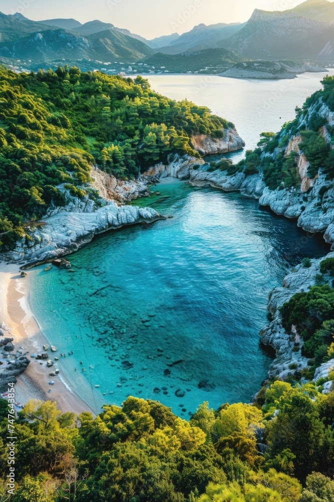 A bird's-eye view of a secluded cove with a heart-shaped beach, turquoise waters, and a lush, green forest surrounding it, under the soft glow of a setting sun