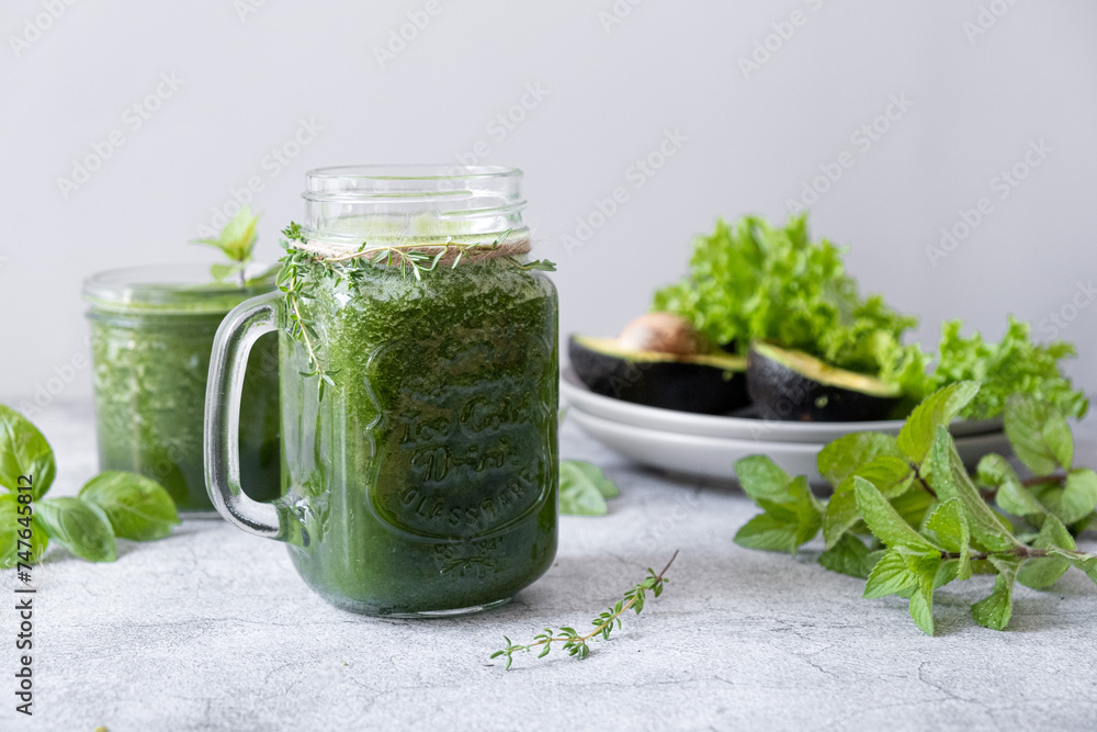 Blended green smoothie with ingredients. Healthy smoothie Blended green smoothie with ingredients. Healthy smoothie