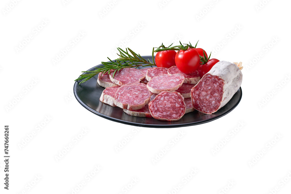 fuet sausage cut in slices on a black plate with peppercorns fuet sausage cut in slices on a black plate with peppercorns