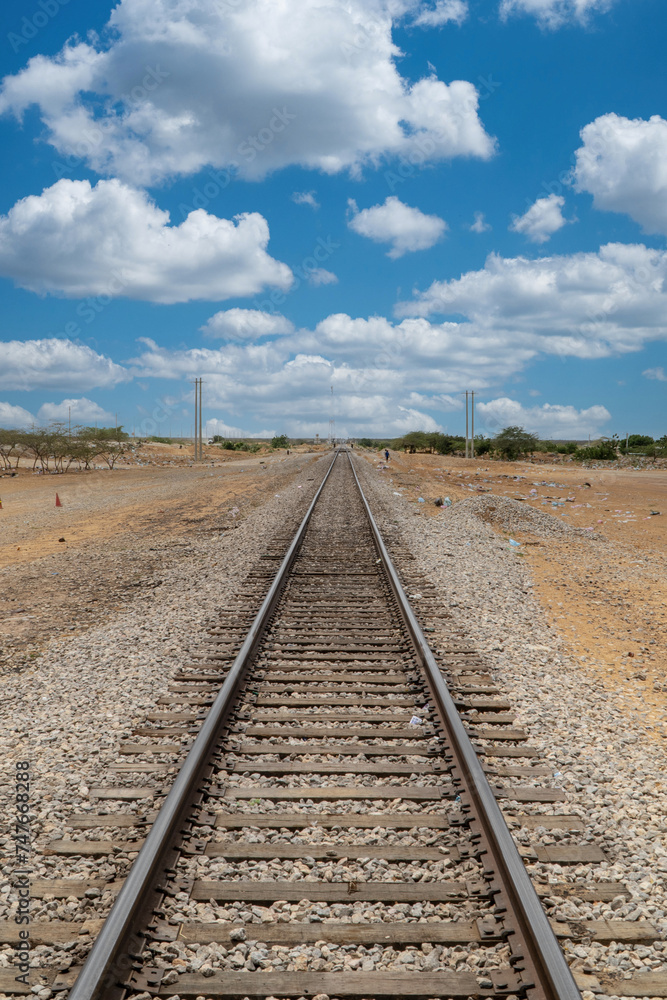 Landscape old train rails and blue sky. Guajira, Colombia