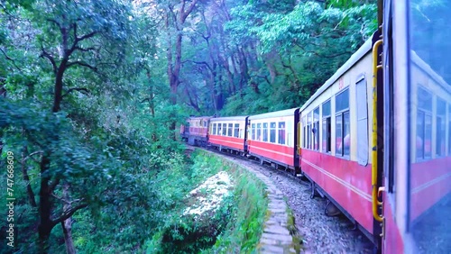 Toy Train Shimla after snowfall Historic train on the way to the Shimla, UNESCO World Heritage Site, Himachal Pradesh, India. photo