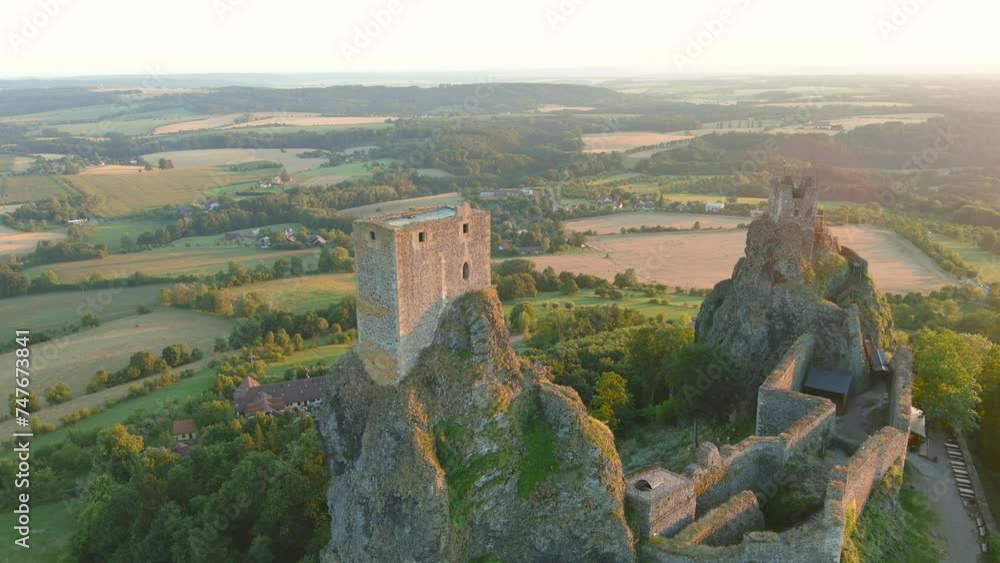 vid-o-stock-trosky-castle-or-hrad-trosky-aerial-sunset-view-famous